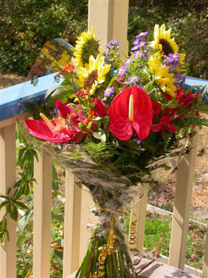 European Hand Tied Bouquet of anthuriums, sunflowers, asters, hypericum