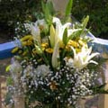 European Hand Tied Bouquet of white oriental lilies, lisianthus, golden button mums, baby's breath