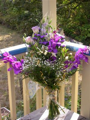 European Hand Tied Bouquet of  mountain blue mokara orchids, alstromaeria, lisianthus, ageratum