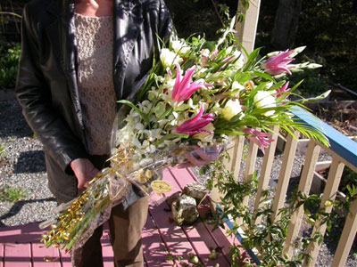 European Handtied Bouquet of dendrobium orchids, pink oriental lilies, tropical foliages, lisianthus, glads, alstro