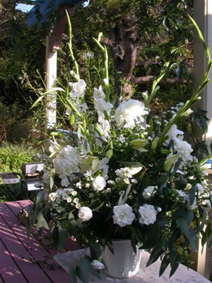 Wedding arrangements can be used both at the ceremony (indoors or outdoors) and then again at the reception.