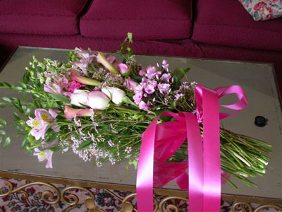 Presentation Style Wedding Bouquet  of roses, alstro, larkspur, phlox, dwarf callas, waxflower