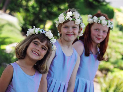Flower girl Hair Leis of roses, minicarnations and ribbons